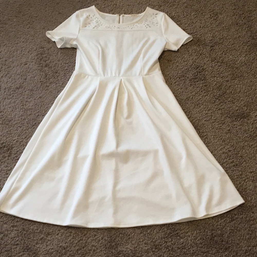 White midi dress with laser cutout detail